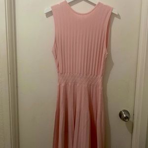 Gently used. Beautiful light pink easy to wear dress. Runs large, about 1 size